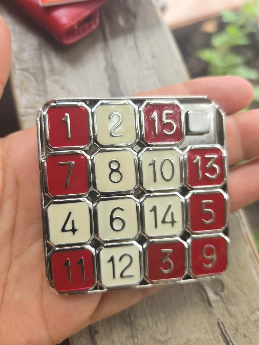 Eddie Bauer Red and Cream Metal Fifteen Puzzle with Red Leather Pouch
